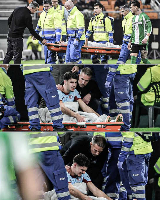 Robin van Persie reacts during a match after his son's injury.
