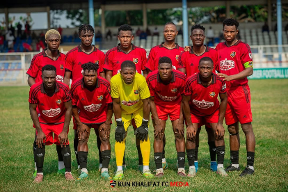 Chijioke Ejiogu celebrates after a successful save during his match debut for Kun Khalifat FC.