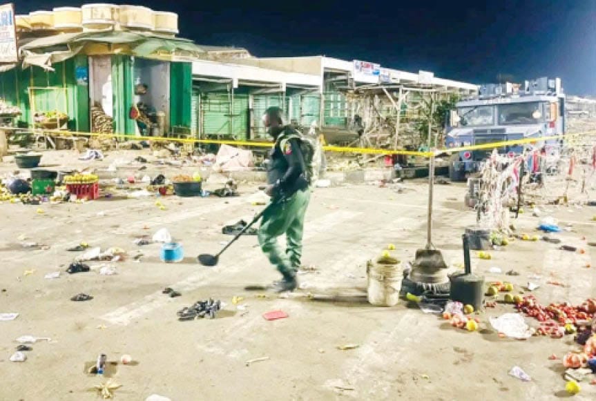 Police anti-bomb operative at the scene of an incident in Maiduguri