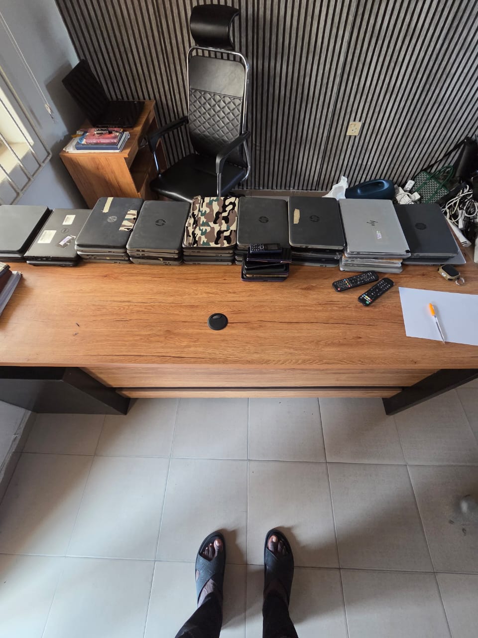 Police raid resulting in the arrest of alleged cybercriminals in Delta.