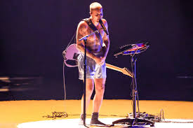 Justin Bieber performing shirtless at the Grammy Awards