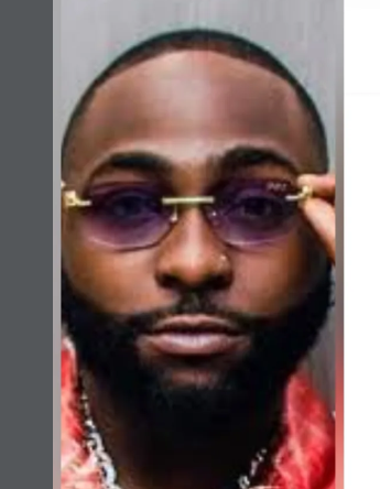 Davido with Indian hotel staff member Govind Kadak during their meeting