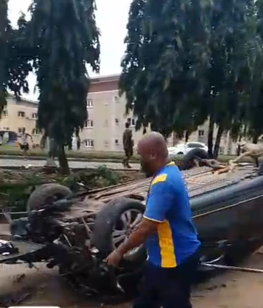 A scene depicting the aftermath of a road accident.