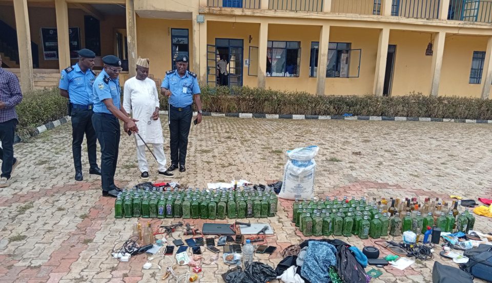 Police officers at a scene in Ondo